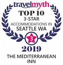 Travelmyth 2019 badge for The Mediterranean Inn as a Top 10 3-star accommodation in Seattle, WA, surrounded by a laurel wreath design.